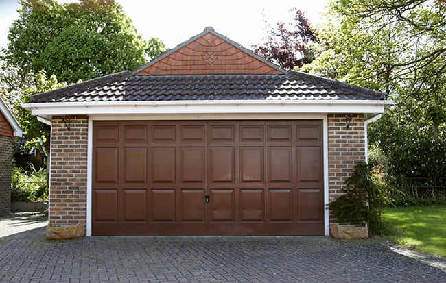 detached garage made out of brick siding